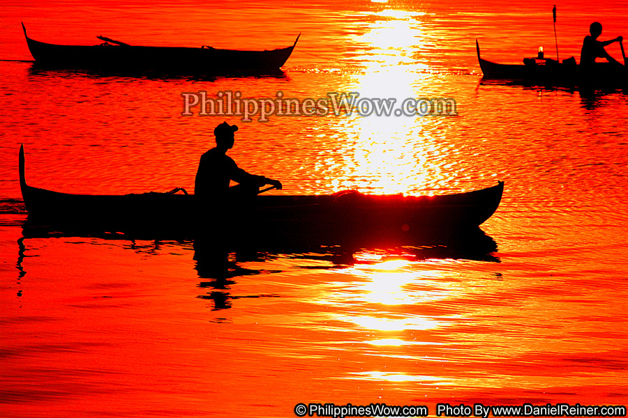 Fishing at sunset in the Philippines